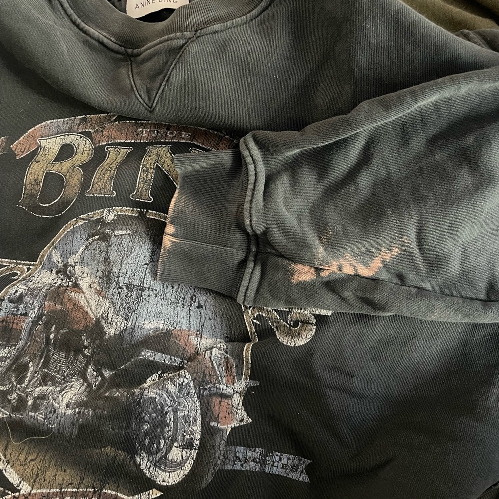 Anine Bing medium sweatshirt. Bleach stain on sleeve